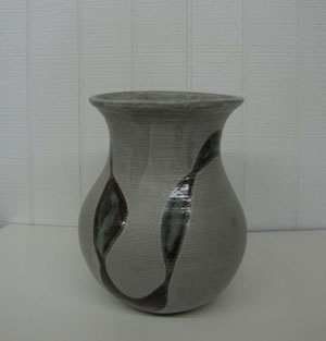 Pottery Artwork by David Michael Brady currently showing at The Water's Edge Studio and Gallery, Artwork is Grey Vase, 12 inches high; Contact thewatersedge at houston dot rr dot com for more information