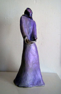 Sculpture Artwork by Pat Moberley Moore currently showing at The Water's Edge Studio and Gallery, Artwork is a ceramic sculpture titled 'Lady with Basket', 15 inches high; Contact thewatersedge at houston dot rr dot come for more information