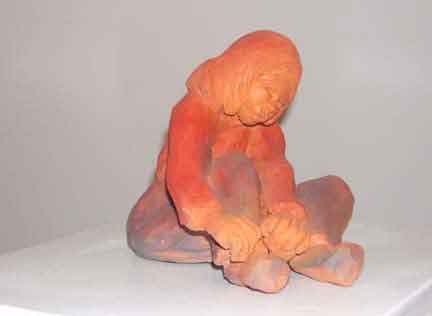 Sculpture Artwork by Pat Moberley Moore currently showing at The Water's Edge Studio and Gallery, Artwork is a terracotta sculpture titled 'Bowtie', 6 inches high; Contact thewatersedge at houston dot rr dot com for more information