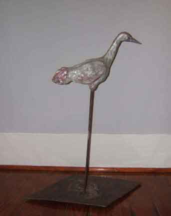 Sculpture Artwork by Pat Moberley Moore currently showing at The Water's Edge Studio and Gallery, Artwork is a ceramic sculpture with patina and steel sculpture titled 'Sandhill Crane',15 inches high; Contact thewatersedge at houston dot rr dot com for more information